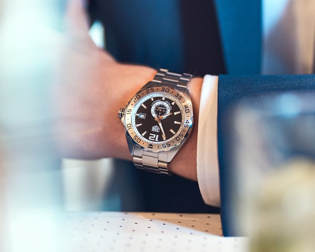 Sports watch with chronograph functions on athletic wrist