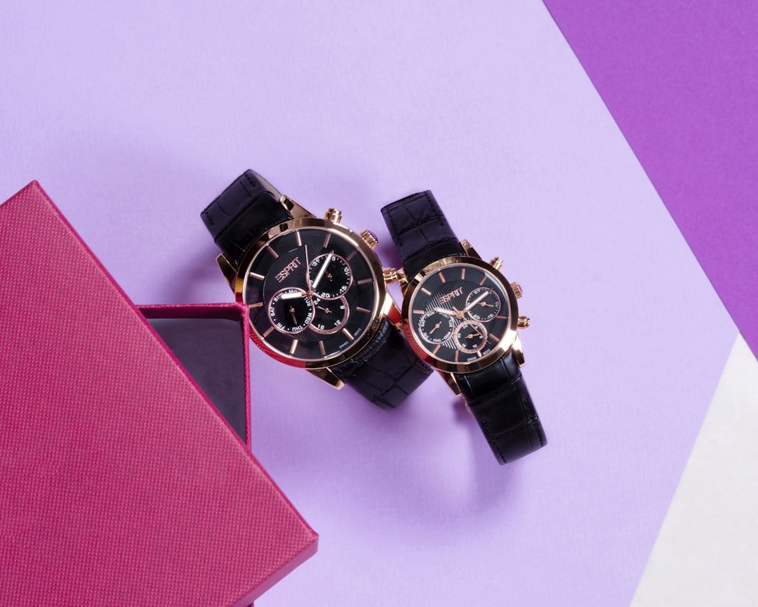 Professional watchmaker adjusting watch movement with specialized tools